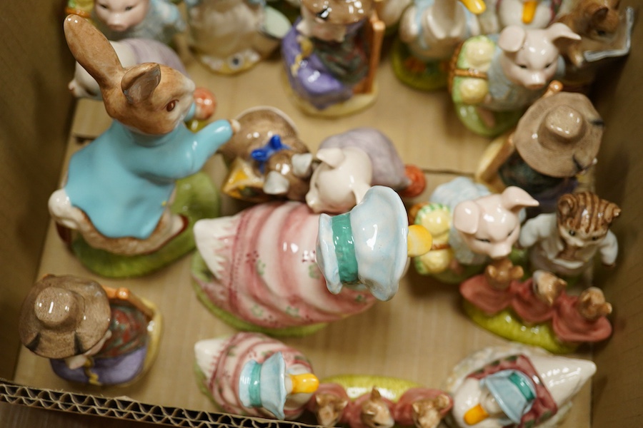 A collection of Royal Albert Beatrix Potter figures, tallest 17cm high